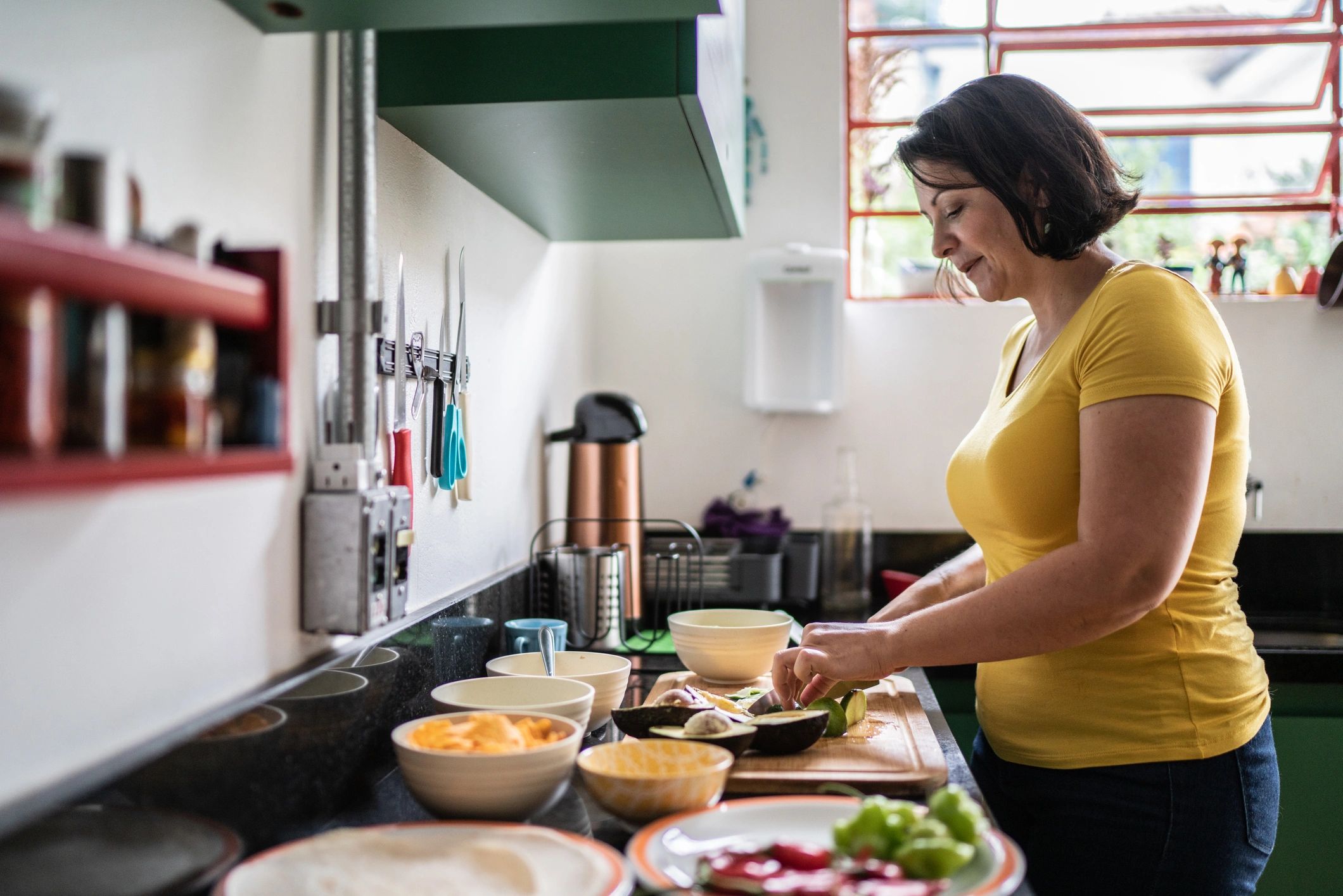 Woman preparing a nourishing meal at home