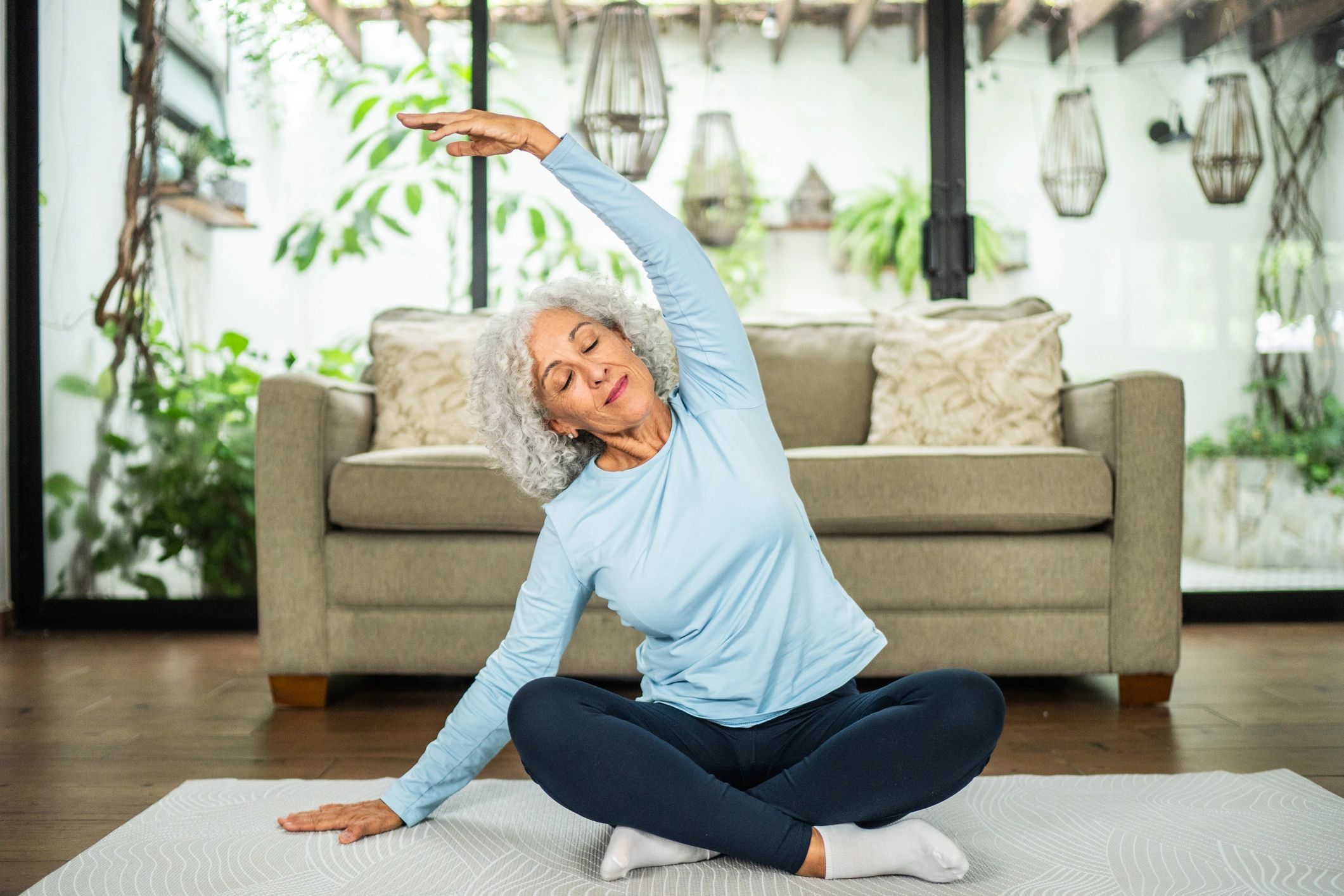 Woman doing gentle stretching at home